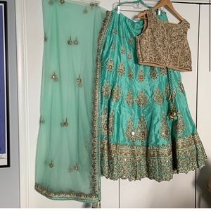 Beautiful hand stitched beaded lehenga with can can skirt